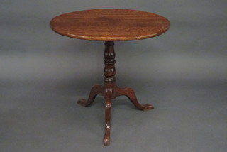 A Georgian oak and mahogany circular snap top tea table 28" the base labelled D & S Battie collection F20