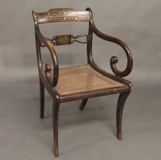 A Georgian mahogany bar back carver chair with woven cane  seat raised on sabre supports