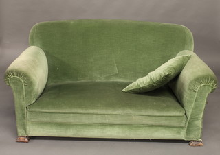 A 1930's Art Deco drop arm Chesterfield upholstered in green material 60"