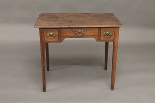 An 18th Century oak side table fitted 1 long and 2 short drawers,  raised on square tapering supports 32"