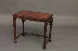 A rectangular Oriental hardwood table, raised on square supports