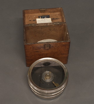 A BIM Mk2 racing pigeon time recorder, contained in an oak  case