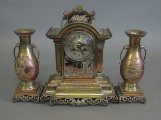 A handsome 19th Century 3 piece clock garniture comprising  striking mantel clock and 2 gilt metal twin handled urns decorated Oriental scenes  ILLUSTRATED