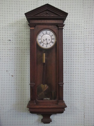 A 19th Century striking regulator wall clock with 7" dial  contained in an oak case