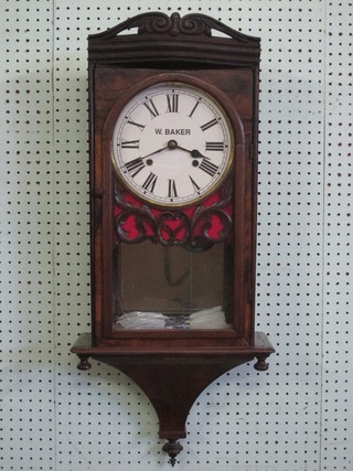 A Continental striking wall clock with 8" dial marked W Baker contained in a walnut case