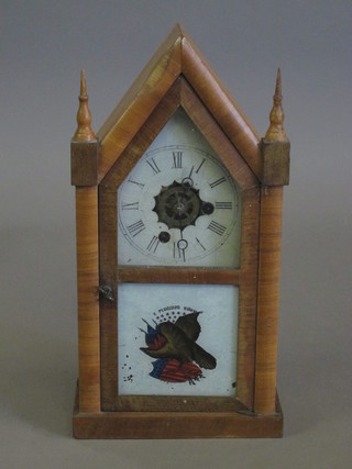 An American 30 hour shelf clock by E N Welch contained in a  walnut case