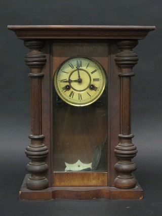 A Vienna style striking regulator with 4" paper dial contained in  a walnut case