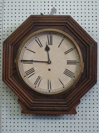 A 19th Century Continental wall clock with 12" painted dial with Roman numerals, contained in a carved oak octagonal case   ILLUSTRATED