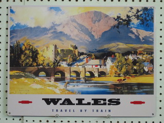 A reproduction enamelled advertising sign - British Railways Western Region, Wales Travel by Train, 12" x 16"