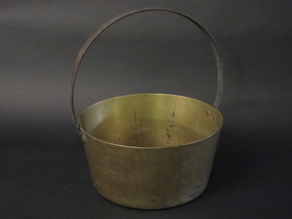 A 19th Century brass preserving pan with iron swing handle