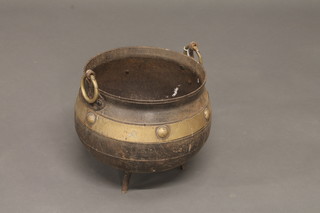 A Victorian circular iron and brass banded cauldron 11"