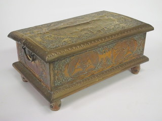A rectangular Indian trinket box with embossed copper decoration and hinged lid, 18"