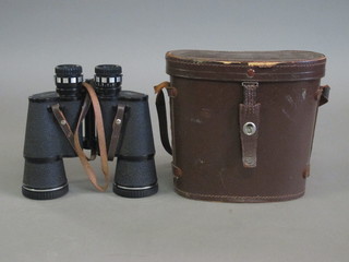 A pair of Wilkinson 10 x 50 binoculars complete with leather  carrying case