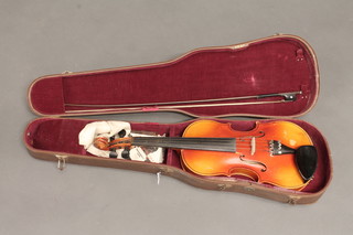 A violin labelled J.T.L Hors Concours 13 1/4", cased and with 1  bow
