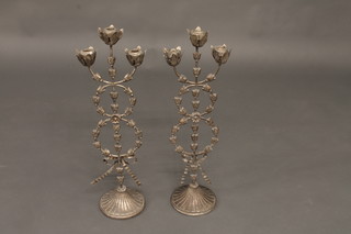 A pair of 3 light metal candelabrum with tulip shaped sconces  25"