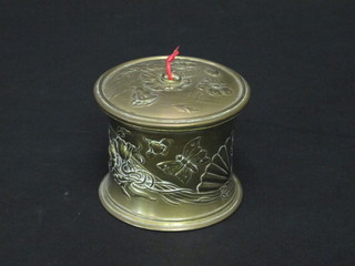 An Art Nouveau waisted and embossed brass string box 3"