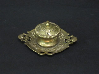 A circular brass inkwell with hinged lid 6"   ILLUSTRATED