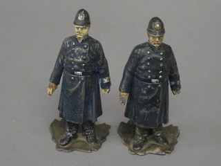 A pair of 19th Century spelter inkwells in the form of standing Policeman 5"  ILLUSTRATED