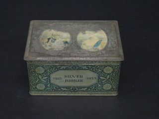 A tin containing a collection of various clay pipes