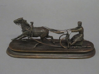 A Continental bronze figure of a horse drawn sleigh, the base inscribed 9"
