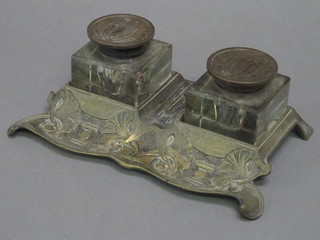 An Art Nouveau gilt metal twin bottle inkwell with 2 square glass  bottles 9"