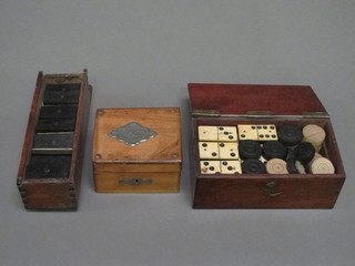 A box of dominoes and a trinket box