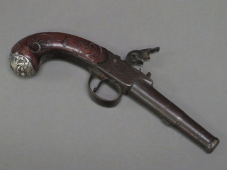 An 18th Century percussion pistol the 3 1/2" barrel and walnut grip inlaid silver, marked Grice