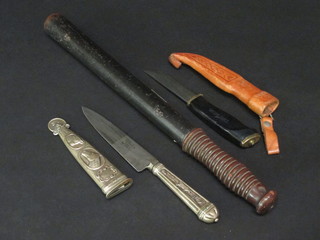 A Metropolitan Police turned wooden truncheon marked SC, a Continental dagger with polished steel sheath decorated a horses  head and a small hunting dagger