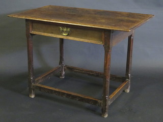 A 17th/18th Century oak side table fitted a drawer and raised on turned and block supports with stretcher 14"   ILLUSTRATED