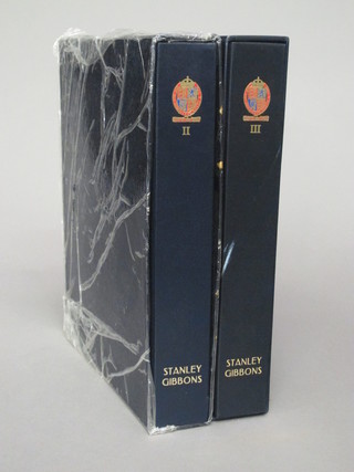 A Stanley Gibbons stamp album volumes 2 and 3