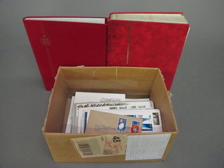 2 stock books of stamps and a collection of first day covers