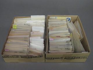 2 shallow boxes containing loose stamps