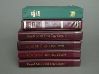 A green New Thames album containing first day covers, a red  Stanley Gibbons British cover album containing first day covers  and 4 Royal Mint first day cover albums