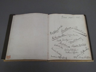 A guest book containing numerous signatures including Victoria Princess Louise of Battenberg, Grand Duchess of Baclen Princess  of Russia and others