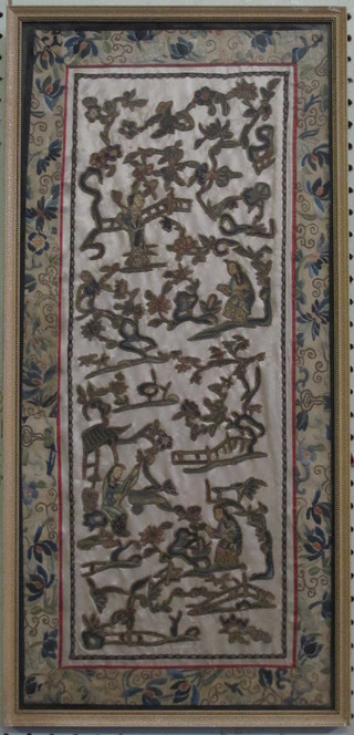 An Oriental rectangular silk embroidered panel depicting figures  23" x 10"