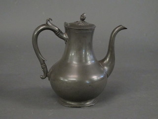 A 19th Century pewter coffee pot with acorn finial