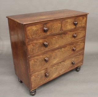 A 19th Century mahogany chest of 2 short and 3 long drawers  with tore handles, raised on pillar supports, 43"