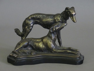 A bronze figure of 2 Afghan hounds 11"