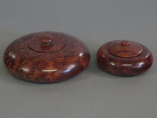 2 turned wooden jars and covers 7" and 4"