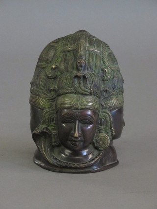 An Eastern bronze figure of a 3 headed Deity 6"