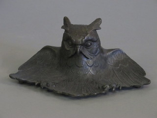 A bronze inkwell in the form of an owl with outstretched wings  9"