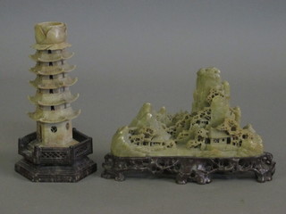 A carved soap stone figure of a Pagoda 7" and 1 other soap stone group