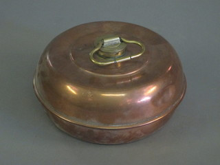 A 19th Century circular copper and brass foot warmer 8"