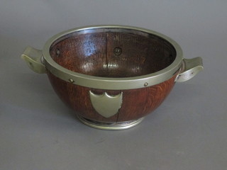 A circular oak coopered fruit bowl with silver plated mounts 9  1/2"
