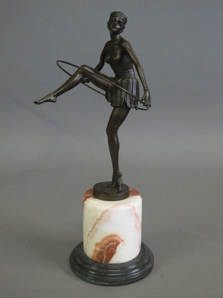 An Art Deco style bronze figure of a dancing girl with hoop,  raised on a marble base 13"