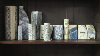 A collection of Carn pottery vases