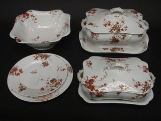 A Limoges 60 piece dinner service comprising 7 graduated meat  plates 21", 20", 17", 15 1/2", 13" and 11" - all f, tureen and  cover 10", twin handled tray 13", square bowl - crack, pair of  tureen, covers and stands 9 1/2" - 1 tureen cracked, pair of sauce  tureens and stands 6" - 1 tureen cracked, 10 dinner plates 10" - f,  10 soup bowls - 3 cracked, 3 chipped, 14 side plates 9" - 13  chipped,
