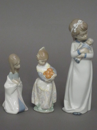 A Lladro figure of a kneeling girl 6", 1 other of girl with basket  of oranges 6" and a Nao figure of a girl with doll 9"