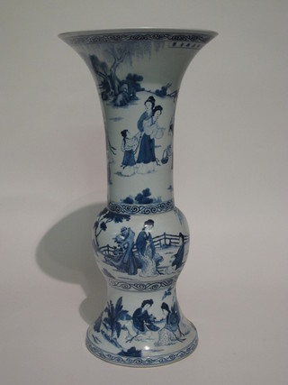A large Oriental blue and white trumpet shaped vase decorated  court figures, the base with 6 character mark 25"   ILLUSTRATED