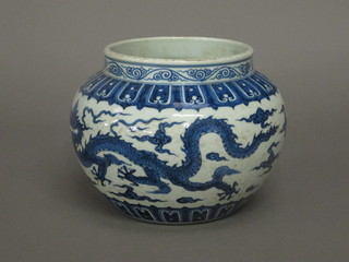 An Oriental blue and white jardiniere decorated a dragon 10"  ILLUSTRATED
